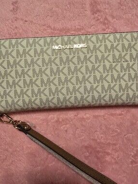 Michael Kors Light Gray Pebbled Leather Wristlet with Gold Logo